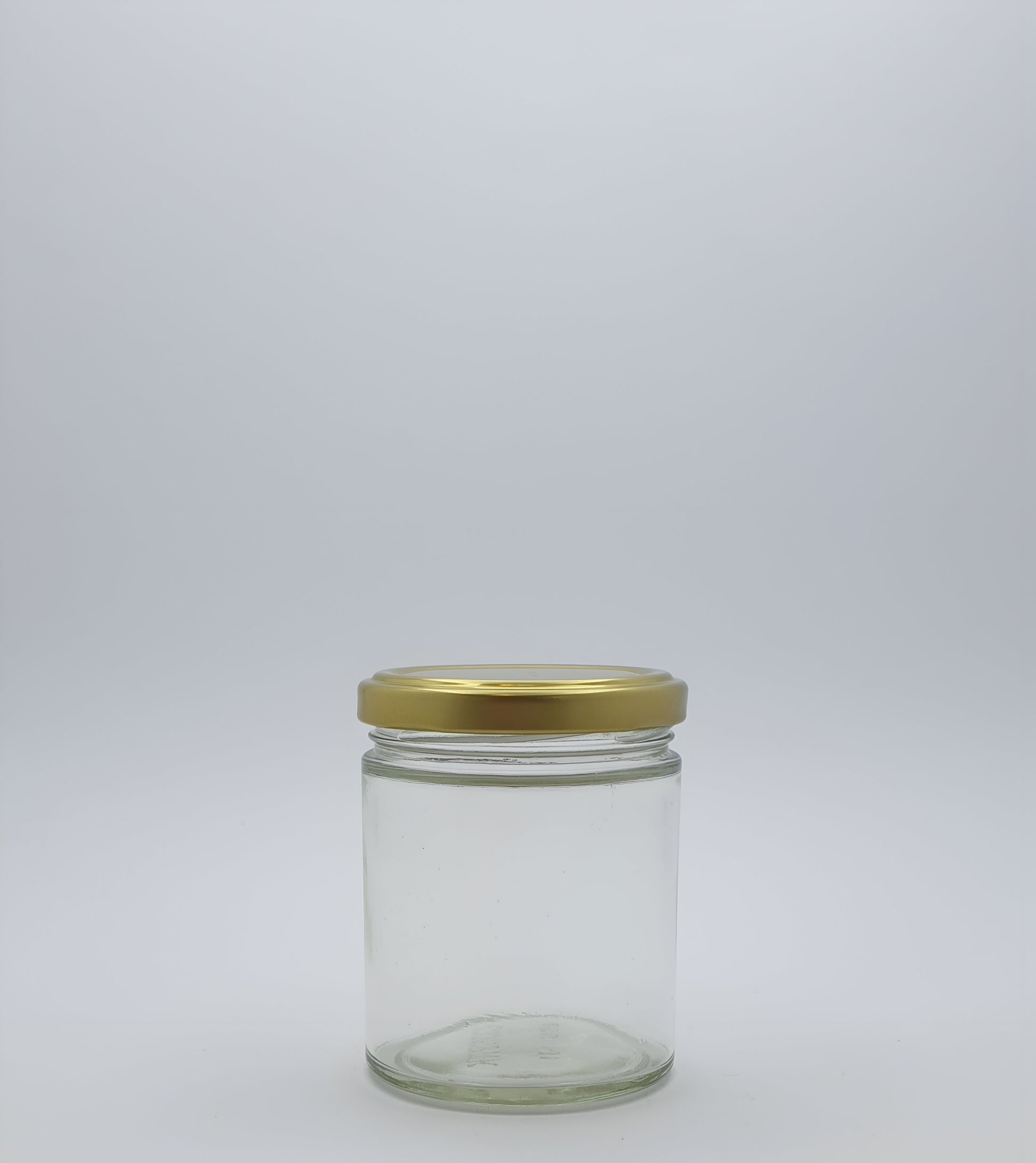 190ml(250gm)Panelled Round Glass Jar with a 63mm Gold Twist Cap 