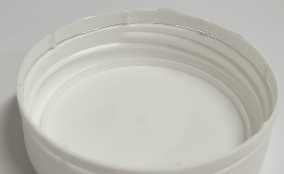 sample of a sealing cap from the inside of the lid